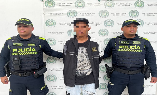 Policia y capturado