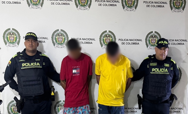 Dos policías y dos capturados por hurto y arma de fuego