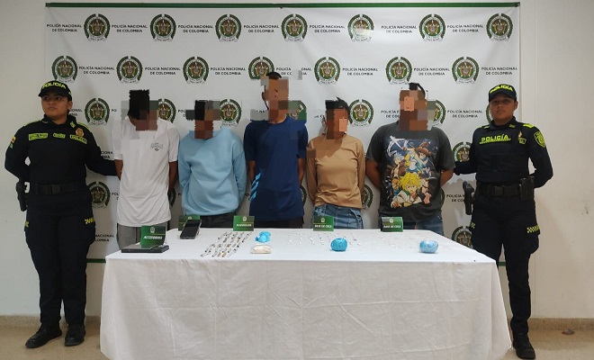 Policia y capturados