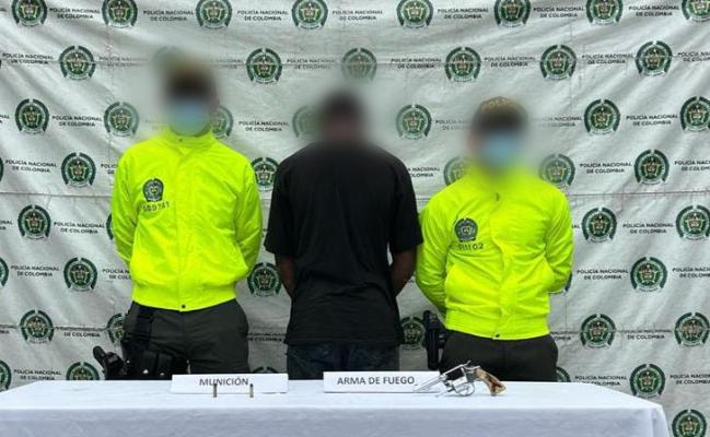 Portaba un revólver ilegal