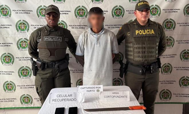 dos Policías y un ciudadano capturado