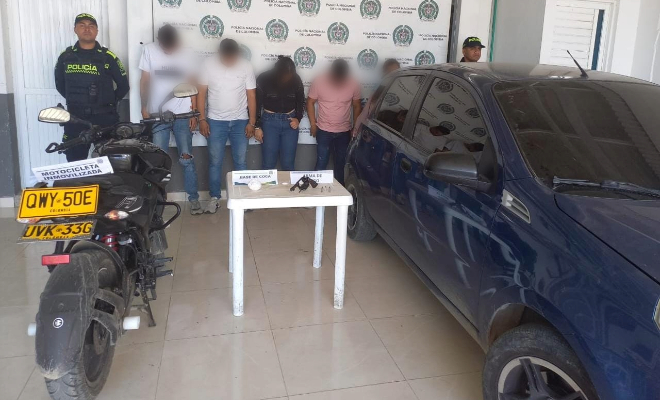 Capturar de cinco personas, quienes se movilizaban con un arma de fuego y base de coca