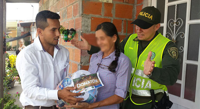 donatón navideña - llevamos alegría y esperanza - poblaciones vulnerables - polica meta