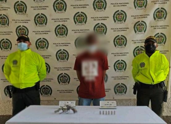 tenía en su poder un arma de fuego y munición
