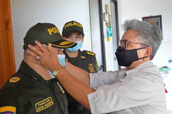 con el grado de Teniente Coronel